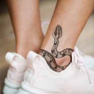 imgi_44_closeup-of-ankle-tattoo-of-a-woman-PJMLBNC1-996x1494
